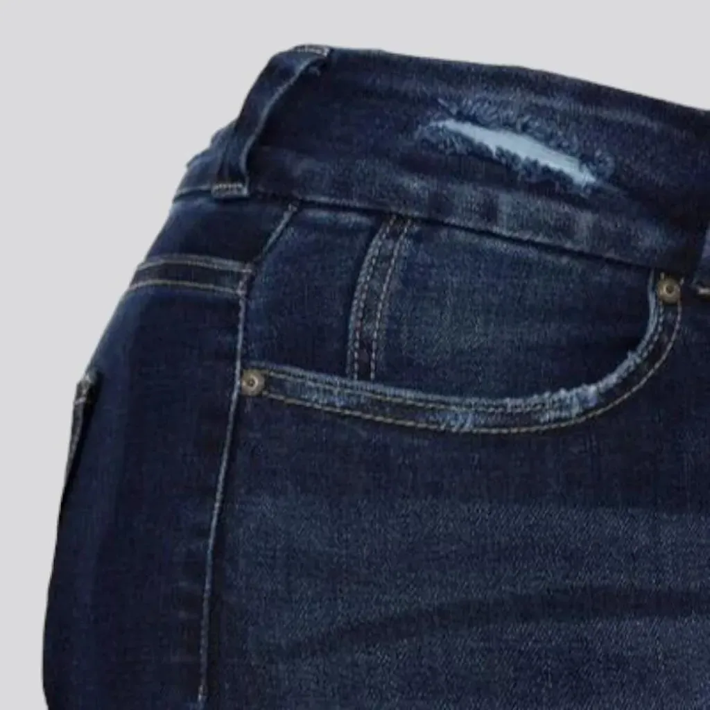 Distressed-hem sanded jeans for women